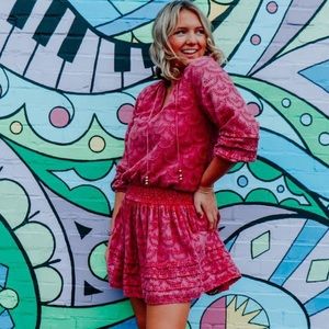 Lovely pink mini dress with cinched in waist line